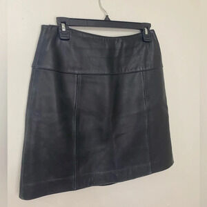 Vintage Valerie Stevens|| Leather Black Mini skirt, with slit detailing.…